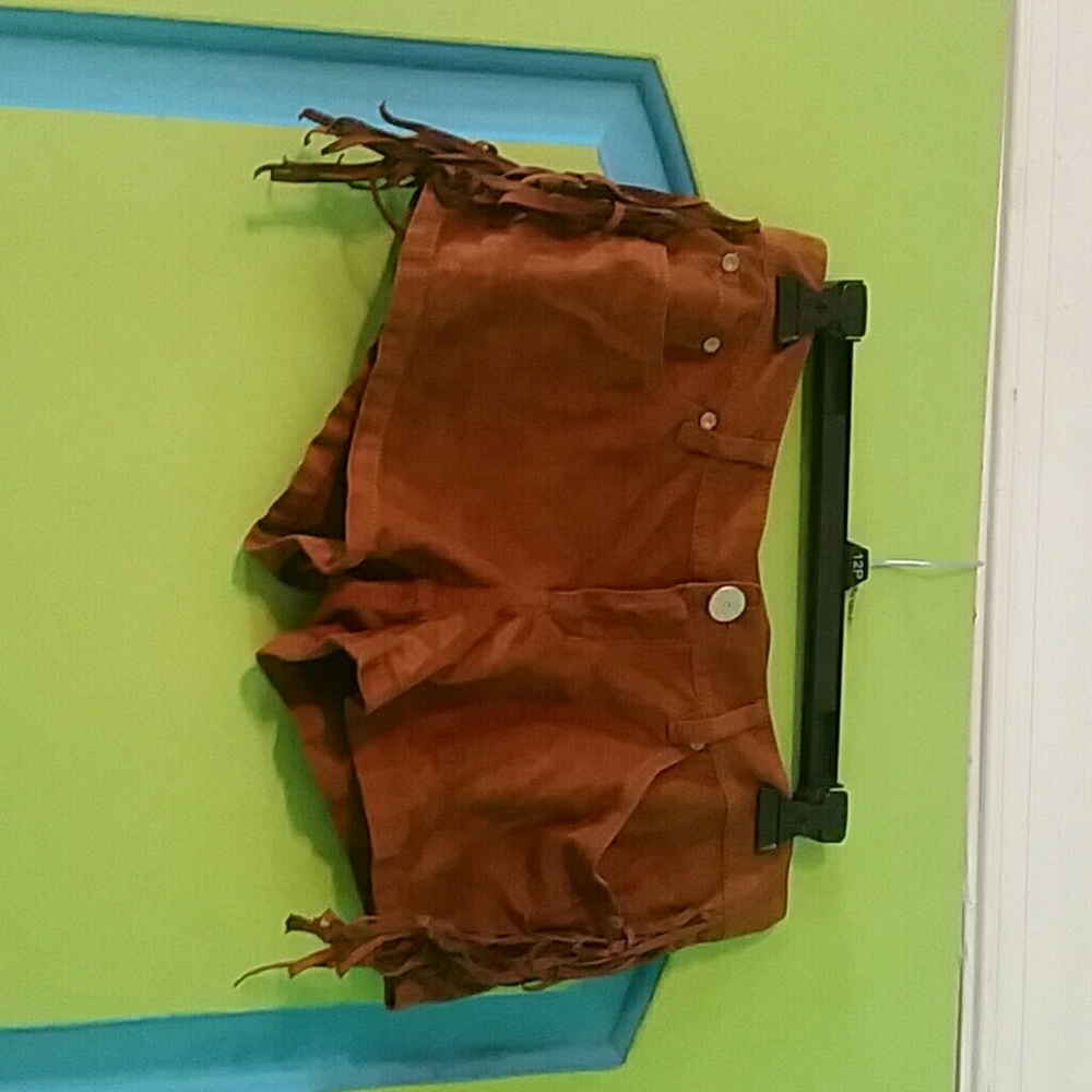 Brown cowgirl shorts.